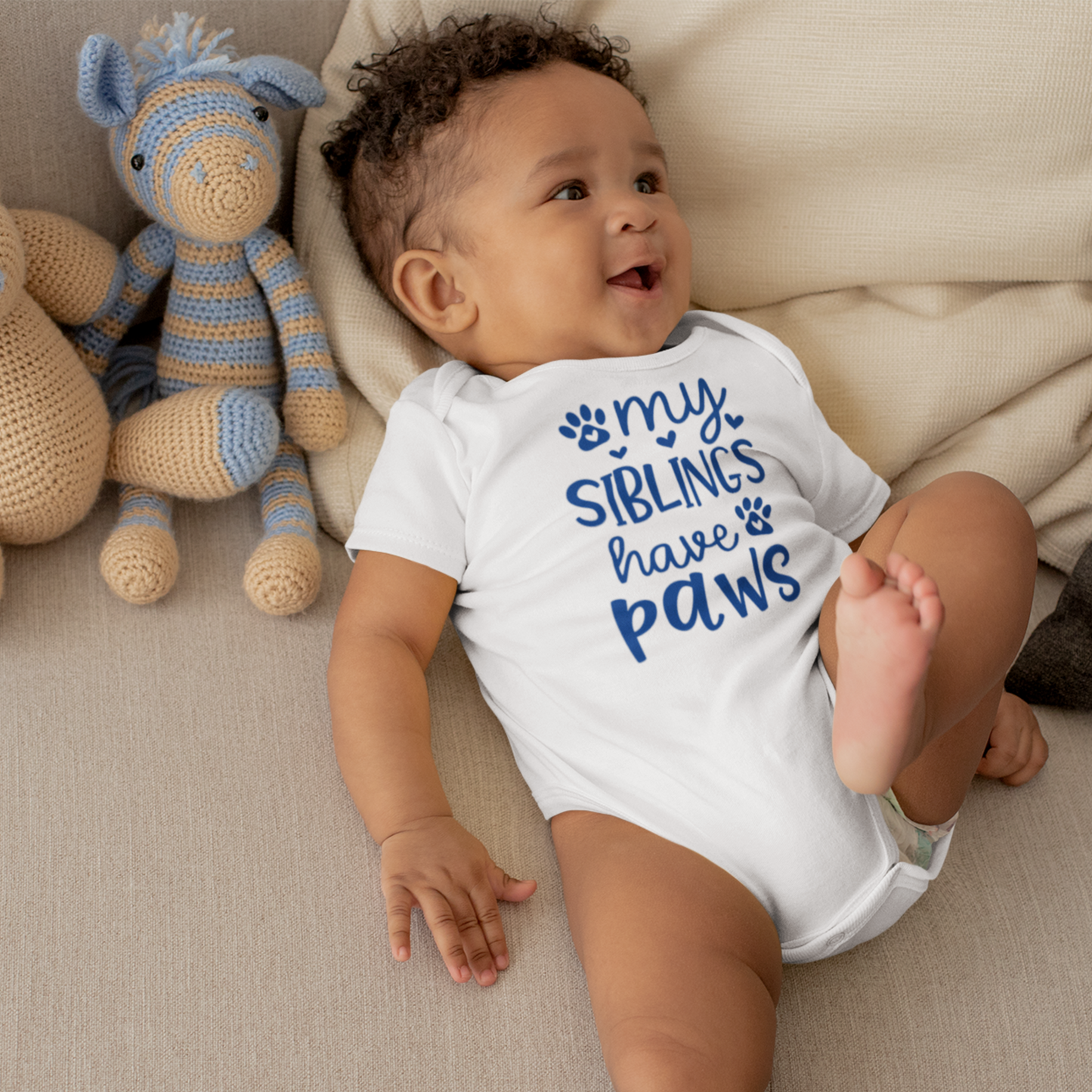 Camiseta de pañales Mis hermanos tienen patas